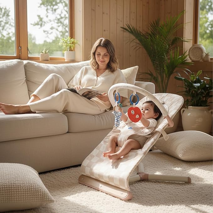 Tiny Marvels Baby Bouncer, 3-Point Harness Baby Bouncer Seat for Newborn Toddler, Portable Baby Rocking Chair with Sensory Toys and Music, Compact & Portable Baby sit up chair (Sand Checks)